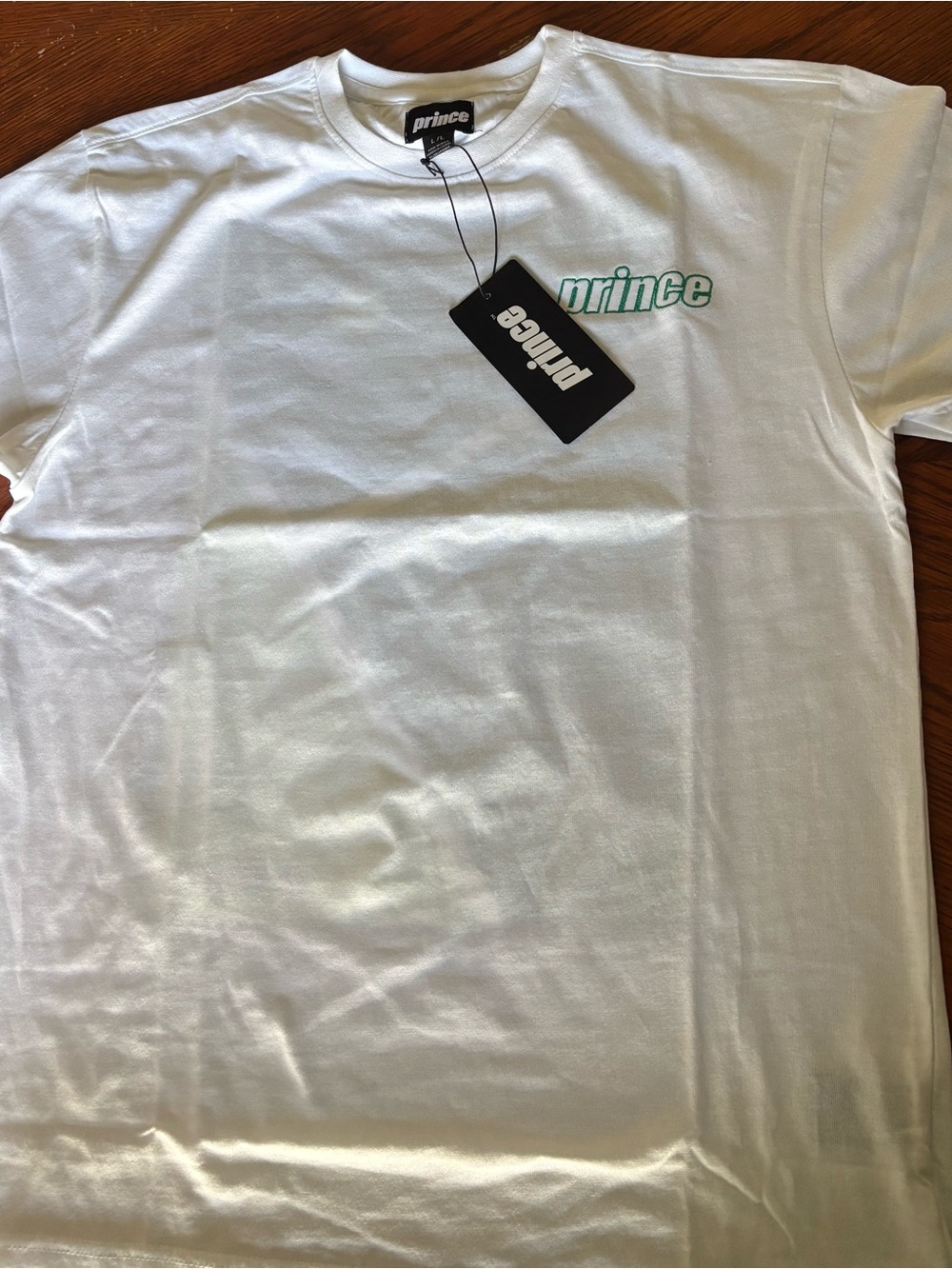 Prince White T-Shirt with Teal Logo